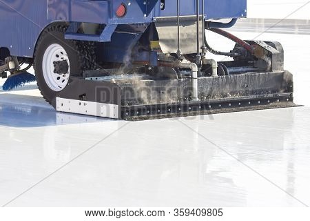 Special Machine Ice Harvester Cleans The Ice Rink. Transport Industry