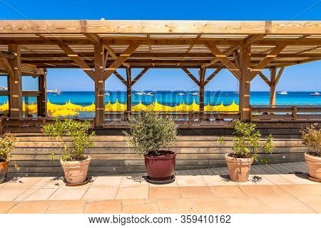 Beach Restaurant With Pergola And Green Plants For Shady Conditions On Corsica Boulevard, France.