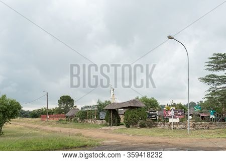 Paul Roux, South Africa - March 1, 2020: A Street Scene, With A Restaurant And Pub, In Paul Roux In 