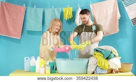 Young Couple Is Having Fun In The Laundry Room. Household Duties Kaa Entertainment.