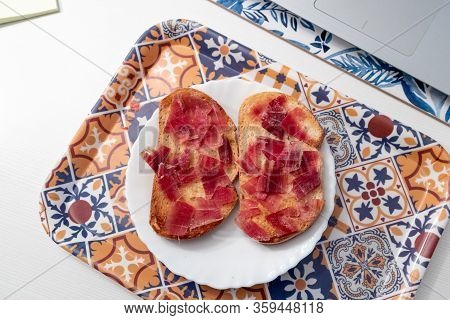 Delicious Spanish Ham Bread Toasts Ready To Eat On A Tray, Top View