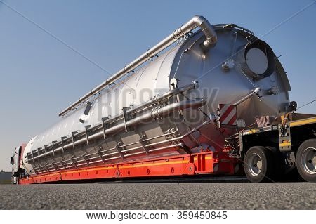 A Truck With A Special Semi-trailer For Transporting Oversized Loads. Oversize Load Or Exceptional C