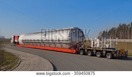 A Truck With A Special Semi-trailer For Transporting Oversized Loads. Oversize Load Or Exceptional C