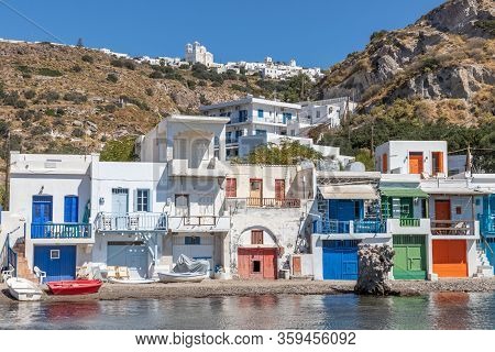 Coloured Houses In Klima Beach With Trypiti Village In Background