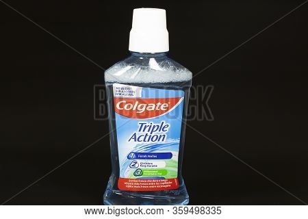 Colgate Mouthwash. The Photo Was Taken On A Black Background In The Studio.