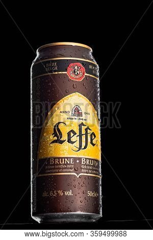 St. Petersburg, Russia, March 30, 2020. Leffe Brune Beer, With Drops Of Water, Metal Can, On A Black