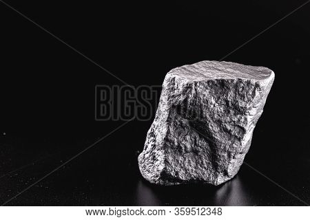 Silver Nugget Native To Liberia Isolated On Black Background.
