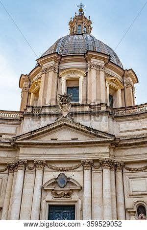 Rome, Italy. Sant Agnesse In Agone Baroque Church In Piazza Navona Square Behind Fontana Dei Quattro