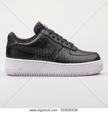 Vienna, Austria - August 6, 2017: Nike Air Force 1 Upstep Black And White Sneaker On White Backgroun