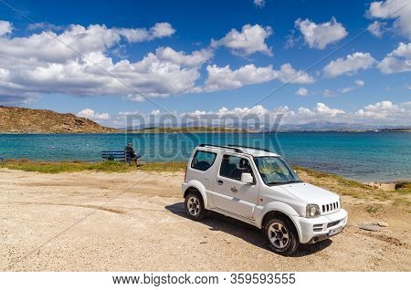 Paros, Greece - April 8, 2014: Suzuki Jimny Car Parked Next To The Monastiri Bay On Paros Island