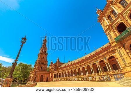 North Tower And Renaissance Central Building With Columns And Arches In The Semi-circular Plaza De E