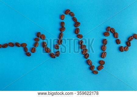 Coffee Beans Show A Bullet On A Blue Background