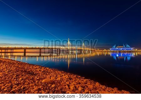 St. Petersburg, Russia, March 30, 2020. Lakhta Center And The Whsd Bridge At Sunset, Blue-yellow Ref
