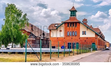 Old Ruined Port Stables And Renovated Slaughterhouse Buildings From Early 1900s In Szczecin Harbour.