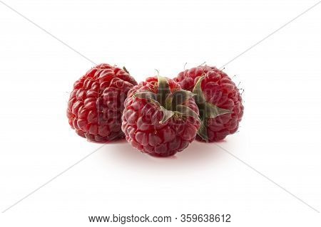 Raspberries Isolated On White Background. Three Ripe Raspberries Close-up. Raspberry With Copy Space