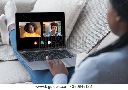 Group Video Chat. African American Woman Having Online Conference Call On Laptop With Friends, Commu
