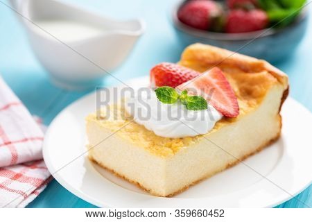 Slice Of Ricotta Cake Or Casserole On White Plate, Closeup View. Tasty Homemade Curd Cheese Or Cotta