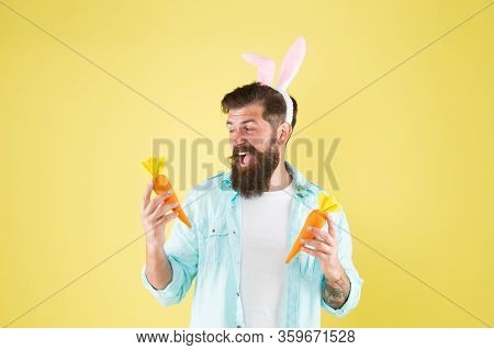 Easter Fast. Easter Rabbit Man Hold Carrots. Happy Hipster Enjoy Vegetarian Food. Vegetarian Diet. V