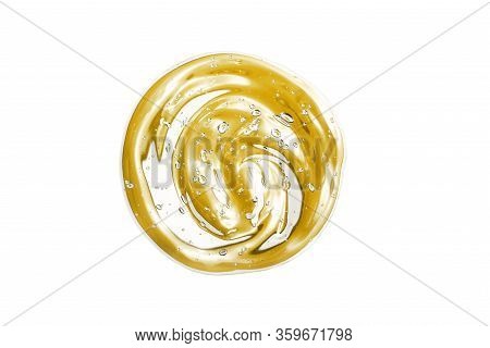 Vitamin C Serum, Cosmetic Gel Texture. Transparent Yellow Gel With Bubbles In A Beautiful Smear