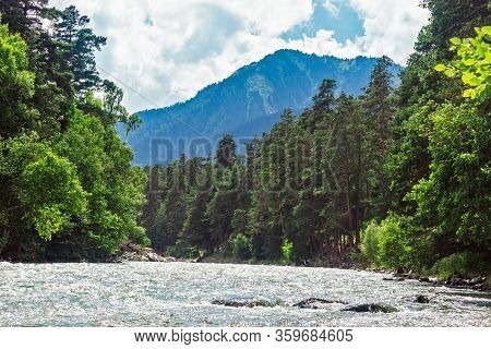 Bolshoy Zelenchuk River In The Caucasus Mountains On A Sunny Day