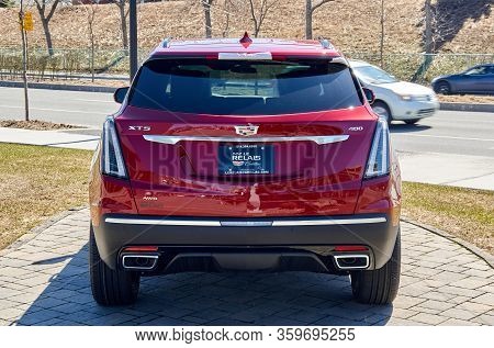 Montreal, Canada - April 4, 2020: Cadillac Xt5 400 Red Car At Dealership. Cadillac Is A Division Of 