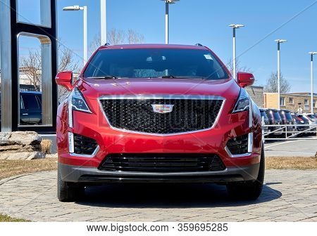 Montreal, Canada - April 4, 2020: Cadillac Xt5 400 Red Car At Dealership. Cadillac Is A Division Of 