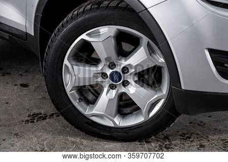 Novosibirsk, Russia - March 04, 2020:   Ford Kuga,  Car Wheel With Alloy Wheel And New Rubber On A C