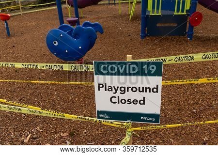 Deep Cove, Canada - April 1, 2020: View Of Sign Playground Closed Due To Covid-19(coronavirus) In Pa