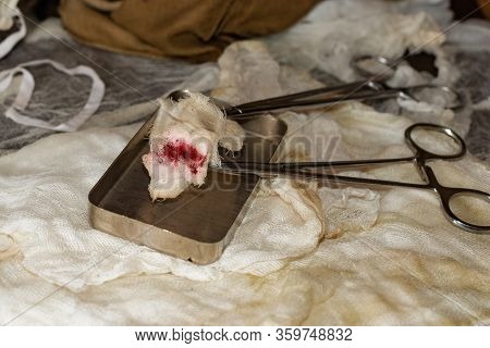 Surgical Instruments, Pliers Clamps With A Cotton Swab During Surgery.
