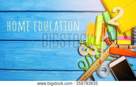 School Desk With The Words Home Education. The Concept Of Prevention From Coronavirus Infection. Sel