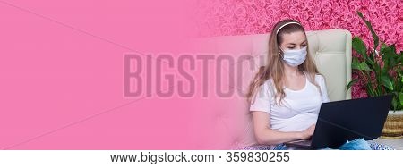 Remote Work In Home Quarantine. Beautiful Caucasian Girl Working On A Laptop In Bedroom In A Protect