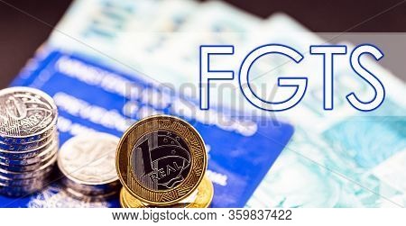 Old Work Card From Brazil, With Coins And Brazilian Money, With The Word Fgts. Concept Of Government