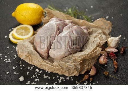 Raw Quail Meat On Kitchen, Cooking Gourmet Bird. Healthy Diet Recipe.