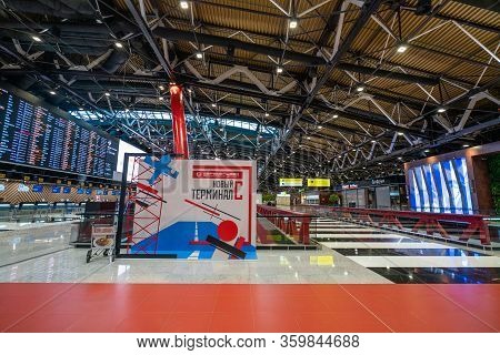 Moscow, Russia - 2020: Sheremetyevo International Airport, Terminal C Without People. Text: New Term