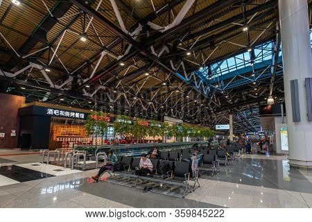 Moscow, Russia - 2020: Sheremetyevo International Airport, Terminal C. Passengers Sit On Armchairs I
