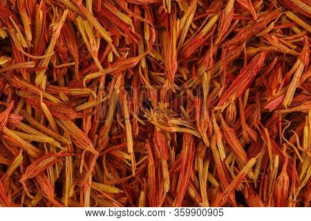 Saffron Super Macro Shot. Fragrant Saffron Background. Texture Of Red And Orange Saffron. Stigmas Of