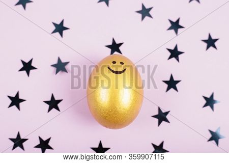 Happy Easter Concept. Top View Of Easter Egg Colored With Golden Paint On Fastive Background With St