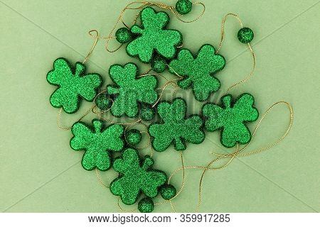 Sparkly Clowers On A Green Background For Saint Patricks Day, Traditional Irish Holiday, Horizontal 