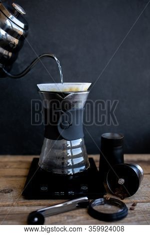 Ground Coffee In The Funnel.the Ritual Of Making Coffee.making Coffee At Home.filtered Or Overflow I