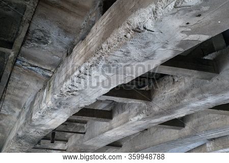 Old Weathered Concrete Beam Under A Bridge
