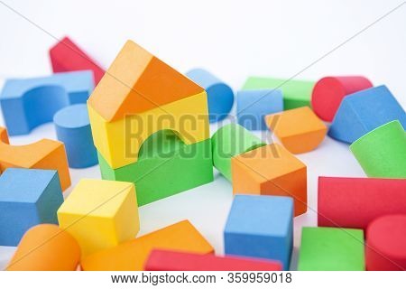 Bright Multi-colored Details Of The Designer. Children's Toy On A White Background. Background Of Co