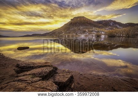 Colorful Clouds Reflect In The Lake At Flatiron Reservoir In Larimer County Colorado