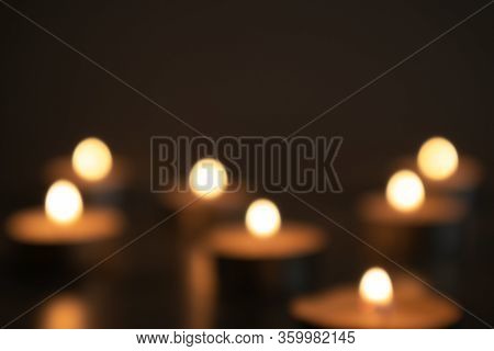 Blurred Light Of Burning Candles In The Dark, Seven Candles, Bokeh