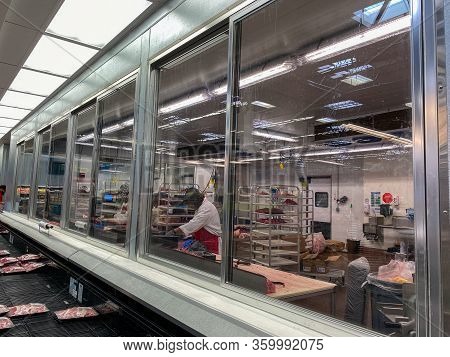 Orlando,fl/usa-3/17/20: Meat Cutters Trying To Restock Products At A Sams Club Where Customers Have 