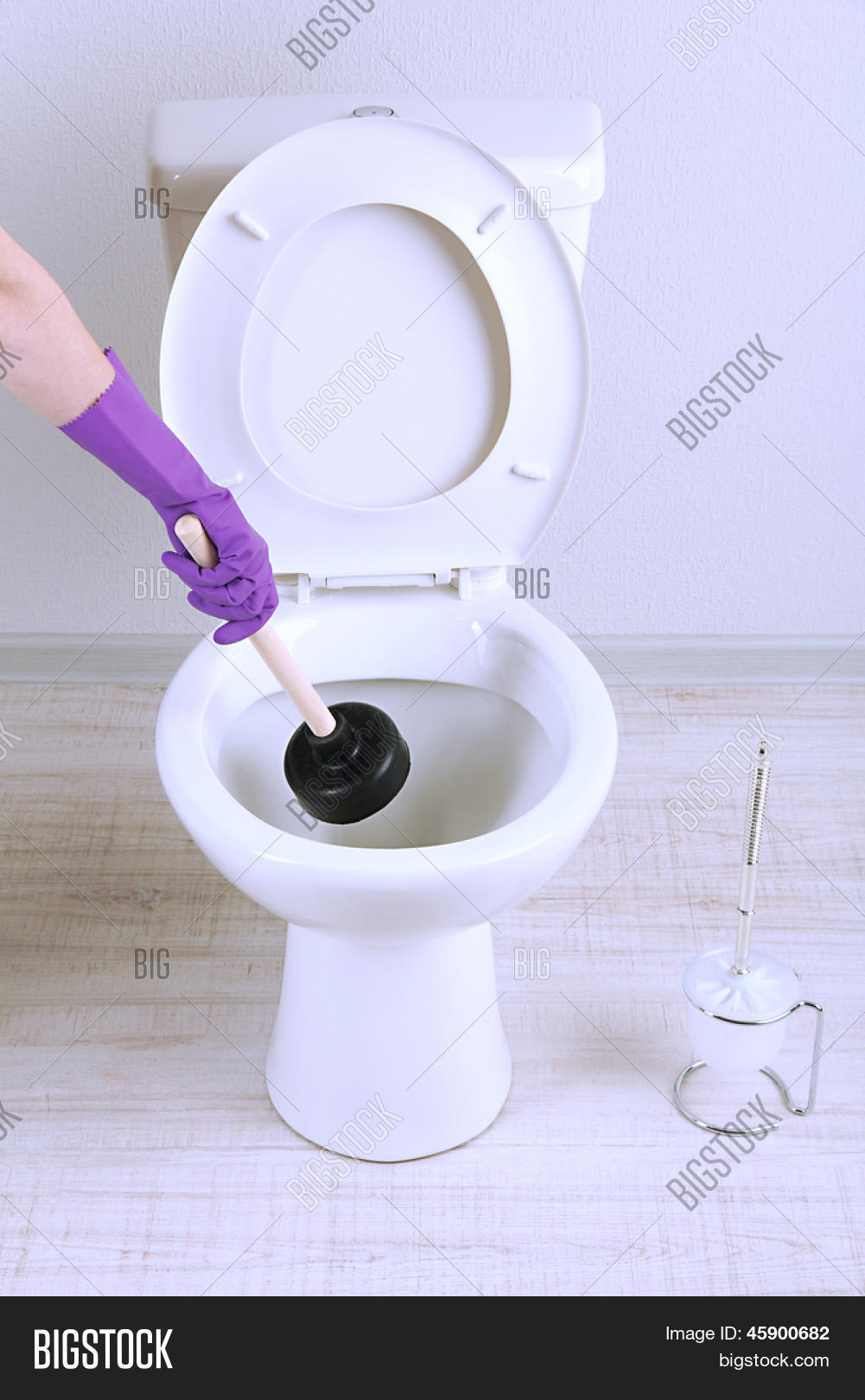 Woman Uses Plunger Image & Photo (Free Trial) Bigstock