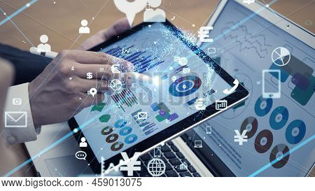 A Business Man Touch Two Different Technology Device Like Pad And Laptop To Show Analysis Chart For 