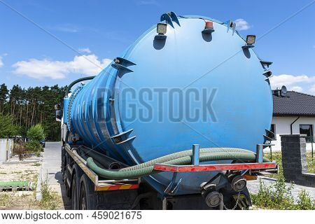 A Truck With A Large Tank For Pumping Out A Septic Tank With A Capacity Of More Than 20 Cubic Meters