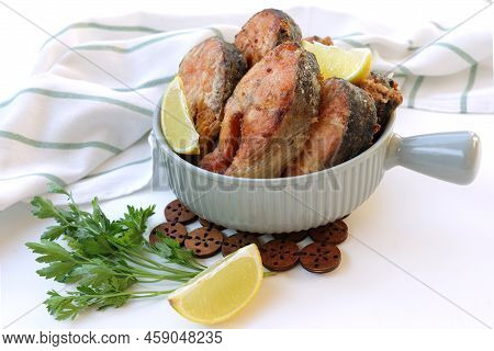 Deep-fried Red Fish With A Delicious Crust. Fried Fish Snacks In A Frying Pan. Pieces Of Keta Fish F