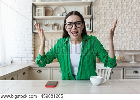Confused Doubtful Woman Feeling Baffled Looking At Camera Unaware About Problem. Portrait Of Clueles