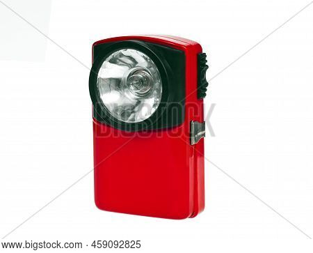 Red Flashlight Torch Isolated On White Background .